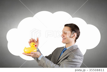 Businessman with duck Businessman with duck 35508811