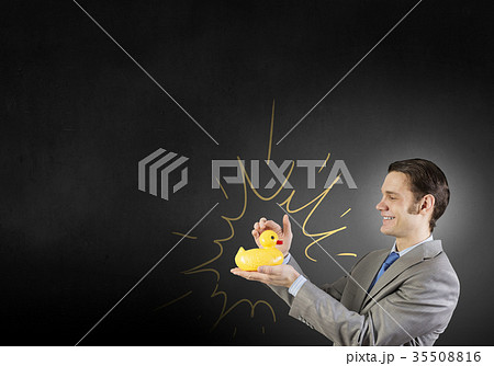 Businessman with duck 35508816