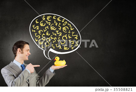 Businessman with duck 35508821