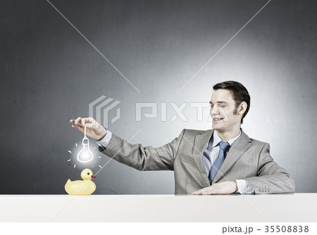 Businessman with duck 35508838