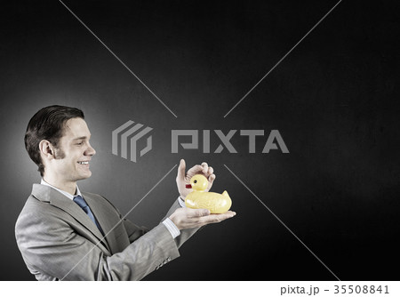Businessman with duck 35508841