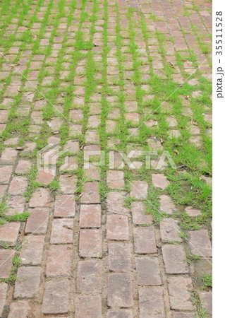 Stone block with grass pavement 35511528
