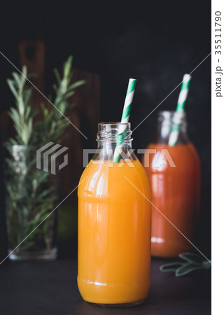 Detox citrus juices in bottle. Fresh grapefruit 35511790