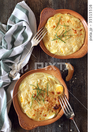 French cuisine. Gratin with eggs, onion and cheese French cuisine. Gratin with eggs, onion and cheese 35515516