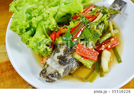 steamed sand goby fish with soy sauce on dish steamed sand goby fish with soy sauce on dish 35516226