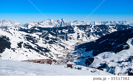 Panoramic view of winter mountains. Alpine peaks Panoramic view of winter mountains. Alpine peaks 35517362