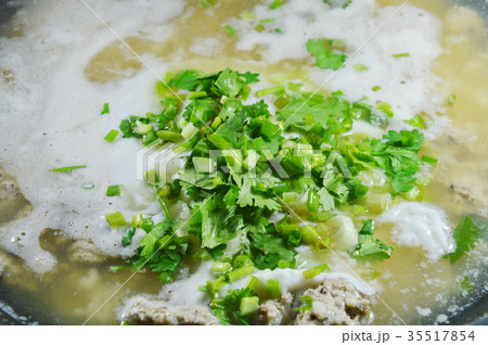 hot boiled rice with minced pork dressing parsley hot boiled rice with minced pork dressing parsley 35517854