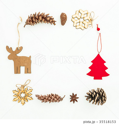 Christmas frame of tree, snowflakes and pine cones Christmas frame of tree, snowflakes and pine cones 35518153