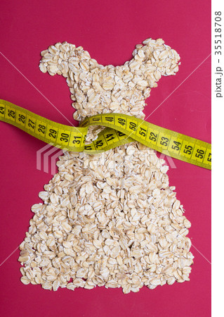 dress shape made from oatmeal with measuring tape 35518708