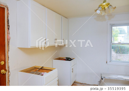 Installing new induction hob in modern kitchen 35519395