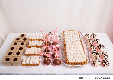 Mix of delicious french desserts on table. Mix of delicious french desserts on table. 35523888