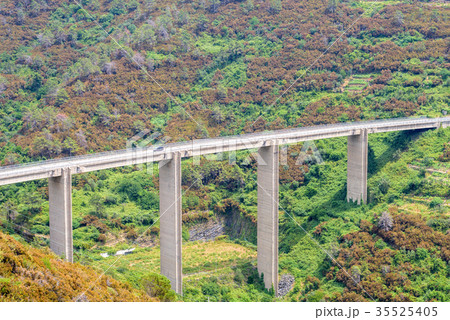 Tall railway in mountains Tall railway in mountains 35525405