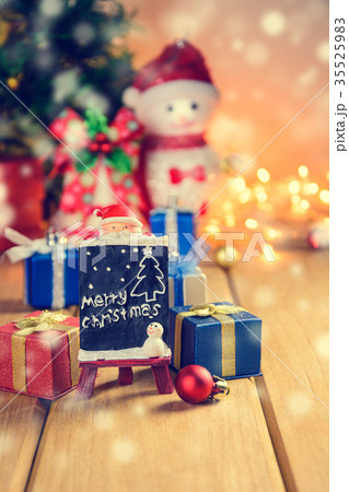 gifts and toys on wooden boards 35525983