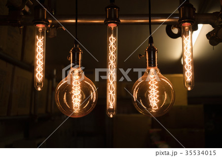 Close up group of hanging light bulbs.Retro style 35534015
