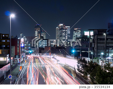 名古屋西区 交通イメージ 国道22号線 名岐バイパス と名古屋駅中心部を望む 夜景の写真素材
