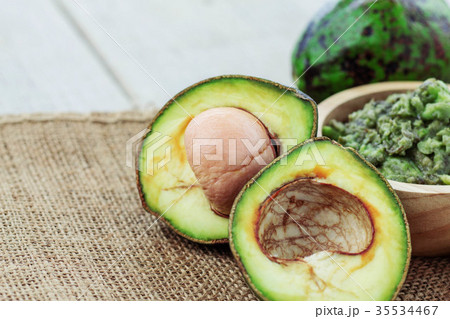 Avocado cut on sack. Avocado cut on sack. 35534467