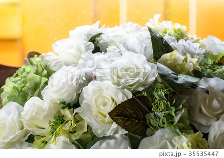 White fake roses in the wedding 35535447