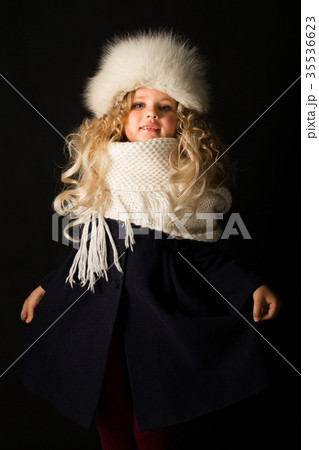 Pretty girl in winter clothes 35536623