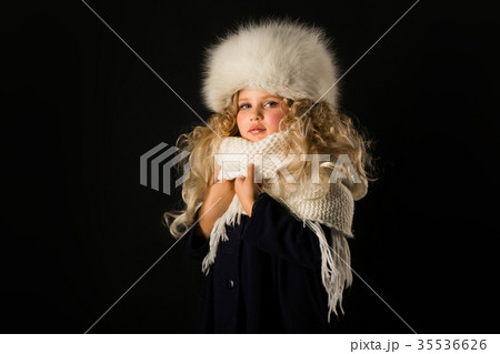 Pretty girl in winter clothes 35536626