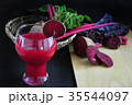 Beetroot Juice with Fresh Beetroot on Background 35544097