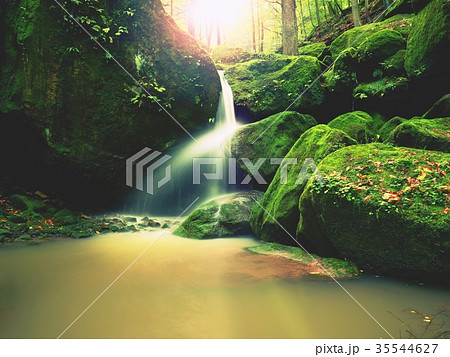 Rapids on small mountain stream. Blurred water Rapids on small mountain stream. Blurred water 35544627