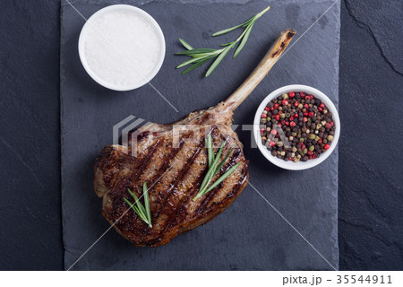 Grilled tomahawk steak 35544911