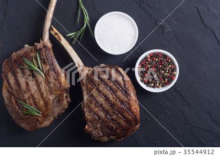 Grilled tomahawk steak 35544912