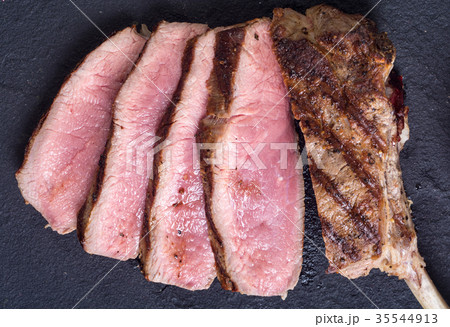 Grilled tomahawk steak 35544913