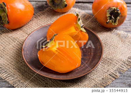 Delicious ripe persimmon fruit 35544915