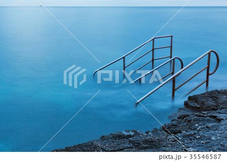 Swim ladder leading to mystic sea 35546587