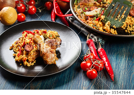 Traditional paella with chicken legs Traditional paella with chicken legs 35547644