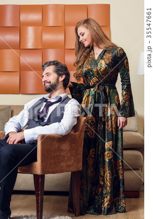 Picture of elegant businessman on chair and long 35547661