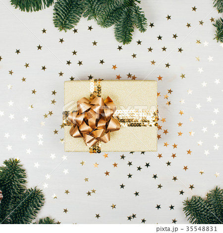 Christmas presents with golden ribbon Christmas presents with golden ribbon 35548831