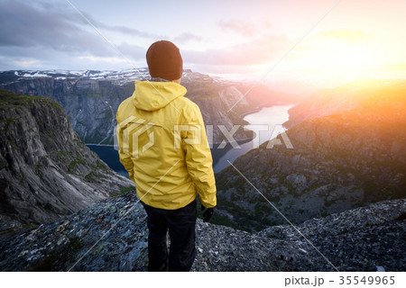 Alone tourist on Trolltunga rock 35549965