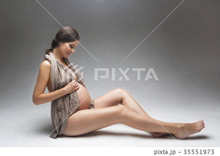 Young pregnant woman in studio 35551973