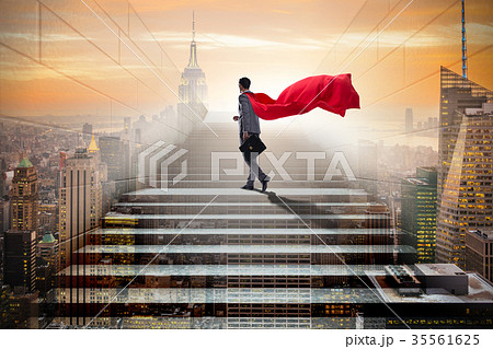 Businessman superhero successful in career ladder 35561625