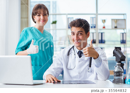 Two doctors having discussion in the hospital 35564832