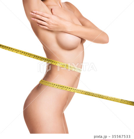 Female body with measuring tape. 35567533