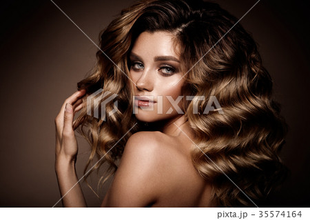 Beautiful young brunette with make-up Beautiful young brunette with make-up 35574164