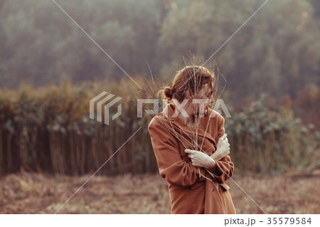 Lonely girl on a walk Lonely girl on a walk 35579584