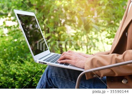business woman works online on laptop business woman works online on laptop 35590144