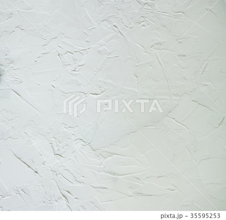 Texture of white concrete wall with rough strokes. 35595253