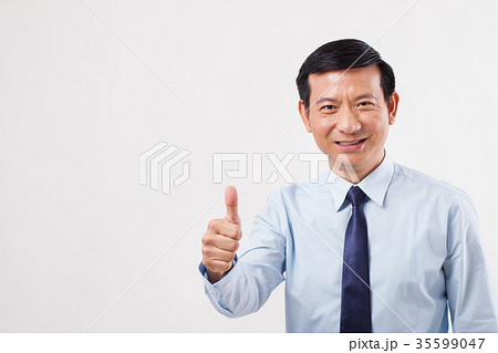 businessman pointing up thumb up gesture 35599047