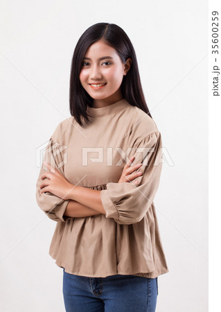 happy smiling asian arab woman studio isolated happy smiling asian arab woman studio isolated 35600259