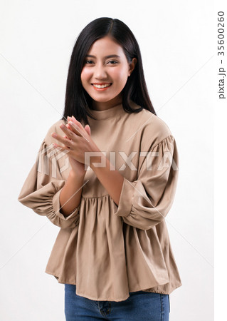 happy smiling woman clapping her hand happy smiling woman clapping her hand 35600260