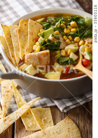 tortilla soup with chicken and vegetables closeup 35603116