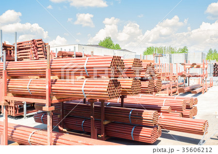 Stack of steel pipes for scaffolding in stock. Stack of steel pipes for scaffolding in stock. 35606212