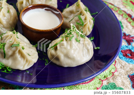 Dumplings, Manti - traditional meat dish of Central Asia, Turkey, Mongolia, Korea.. Dumplings, Manti - traditional meat dish of Central Asia, Turkey, Mongolia, Korea.. 35607833