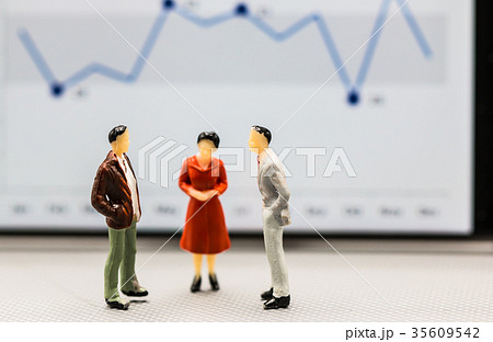 figures businessmen stand with graph on the phone 35609542