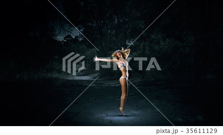 Dancing blonde in bikini 35611129